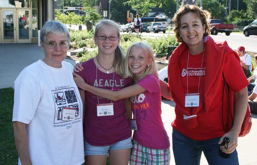 Three generations: Bonnie Downs (left) with granddaughters Kira and Cassidy and Lynn Ihlenfeldt '80