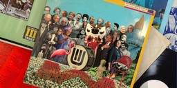 A UW-themed rendition of the Sergeant Pepper's Lonely Hearts Club Band album cover featuring Bucky Badger and notable UW alumni.