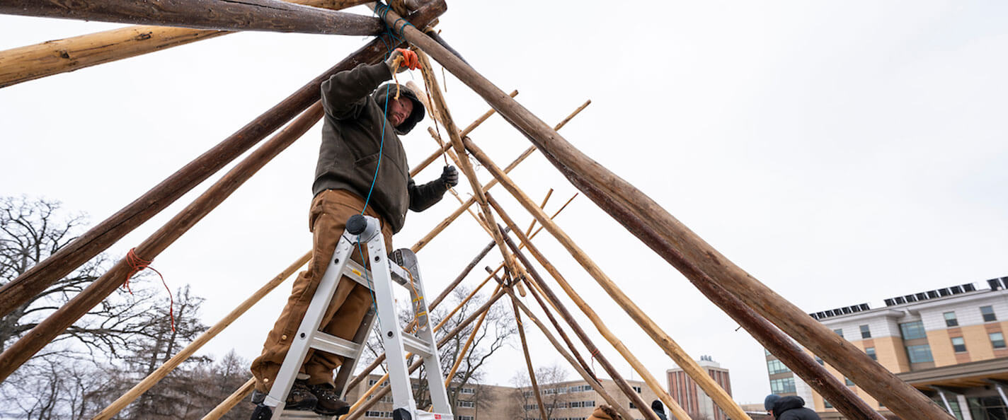 Cornelius constructs a traditional Indigenous lodge on campus.