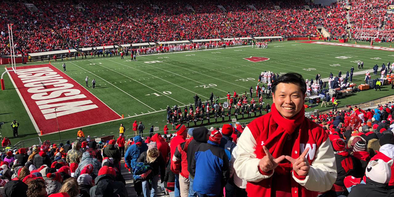 Jemmy Chayadi at a Badger football game