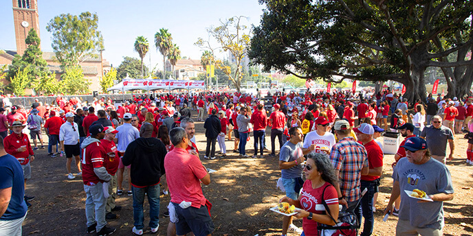 Wisconsin Badger fans gather at a HUDDLE