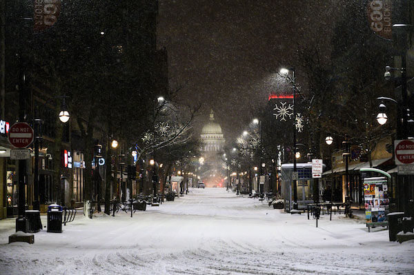 A quiet State Street leading to the Wisconsin State Capital is pictured from the University of Wisconsin campus during a snowy winter night on Jan. 17, 2020. (Photo by Brian Huynh /UW-Madison)