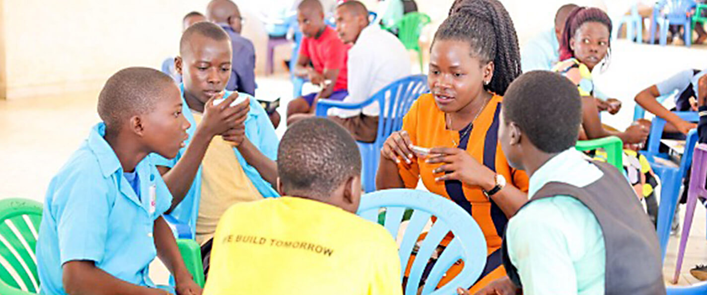 School children play the 6 STA-Z board game.