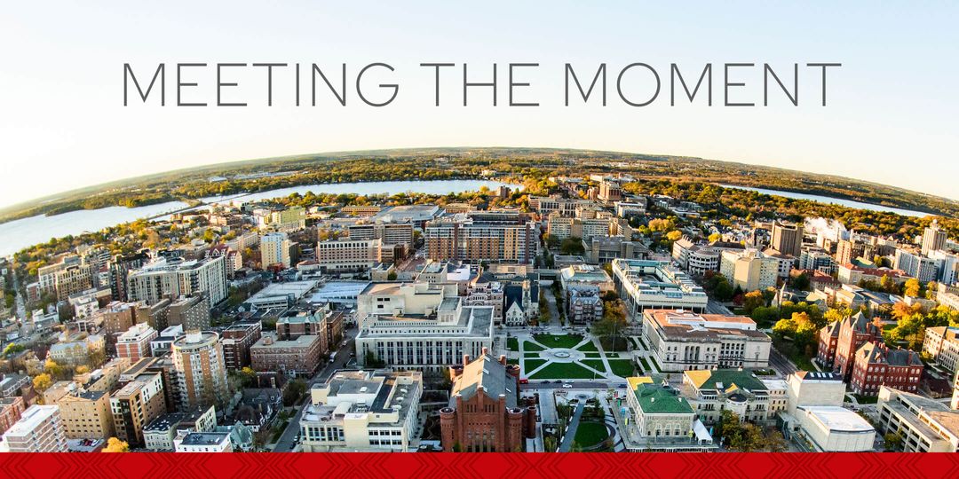 Aerial view of the UW campus with text in the foreground reading "Meeting the Moment"