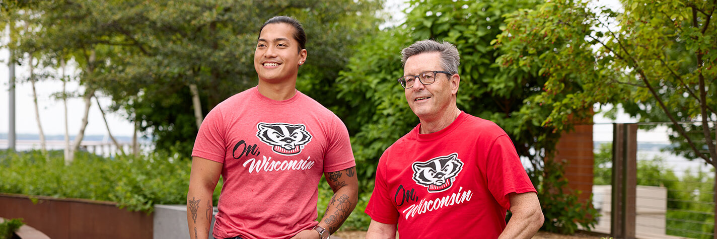 Two people wearing The Red Shirt, 17th Edition
